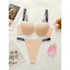 Beige small chest lifting underwear set with black and white straps from The Lady's Haven Boutique