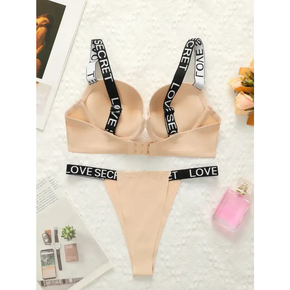 Nude small chest lifting underwear set with black love secret straps from The Lady's Haven Boutique