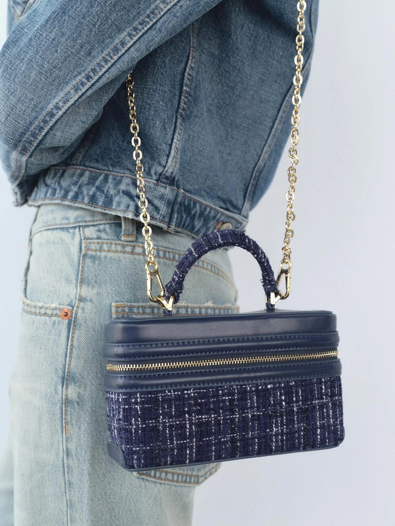 The Lady's Haven Boutique small square bag in navy blue with gold chain strap and textured fabric detail