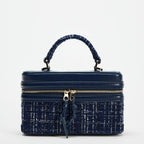 The Lady's Haven Boutique small square bag in navy with textured fabric and zipper closure