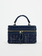 The Lady's Haven Boutique small square bag in navy blue with textured fabric and top handle