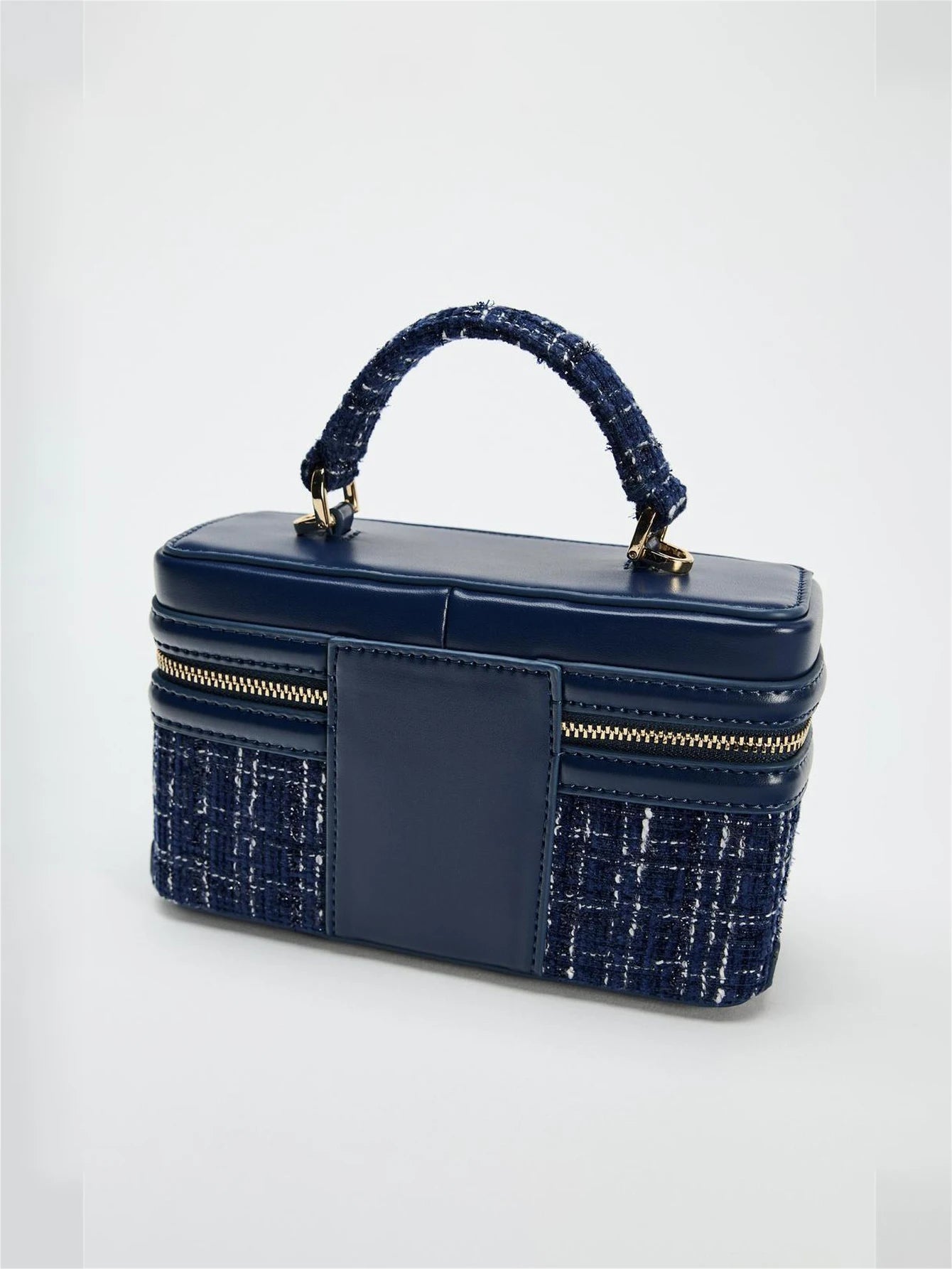 Navy blue small square bag with tweed texture and top handle from The Lady's Haven Boutique
