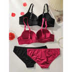 Solid color bra and panty set in black and red with adjustable straps from The Lady's Haven Boutique