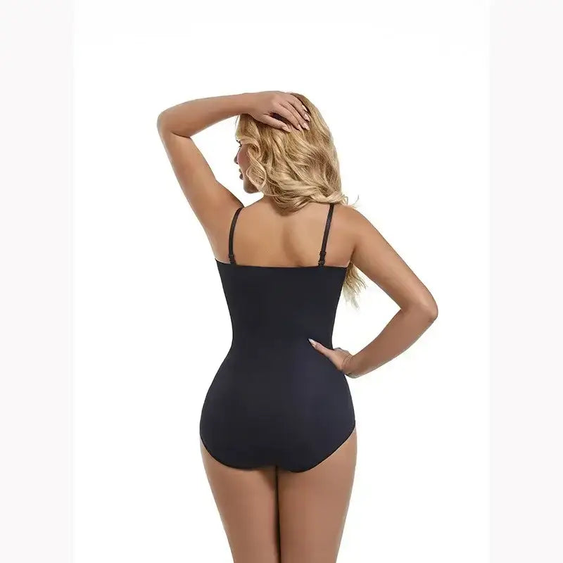 Black strapless shapewear bodysuit from The Lady's Haven Boutique shown from back with adjustable straps