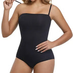 Black strapless shapewear bodysuit worn by model with removable shoulder straps