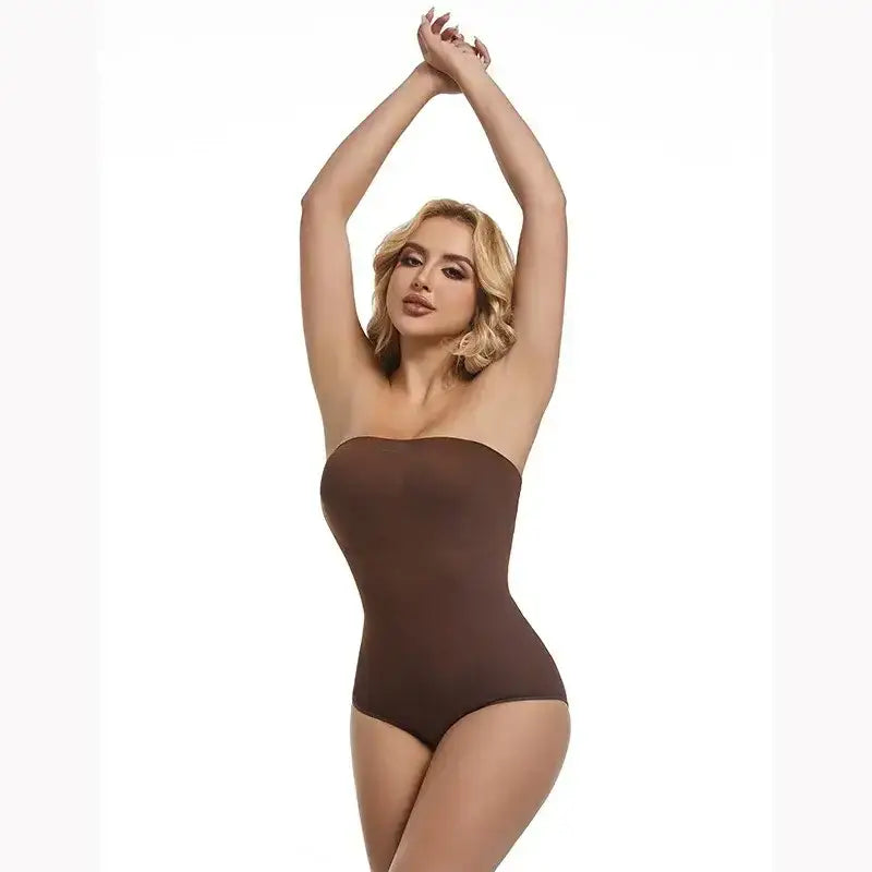 The Lady's Haven Boutique brown strapless shapewear bodysuit worn by woman with arms raised