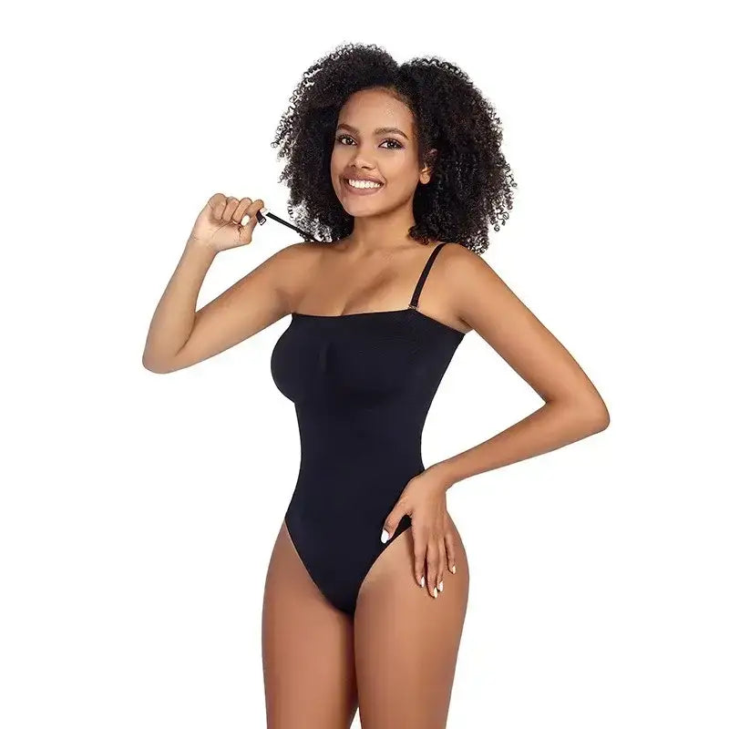 Black strapless thong bodysuit for women modeled by smiling woman adjusting shoulder strap