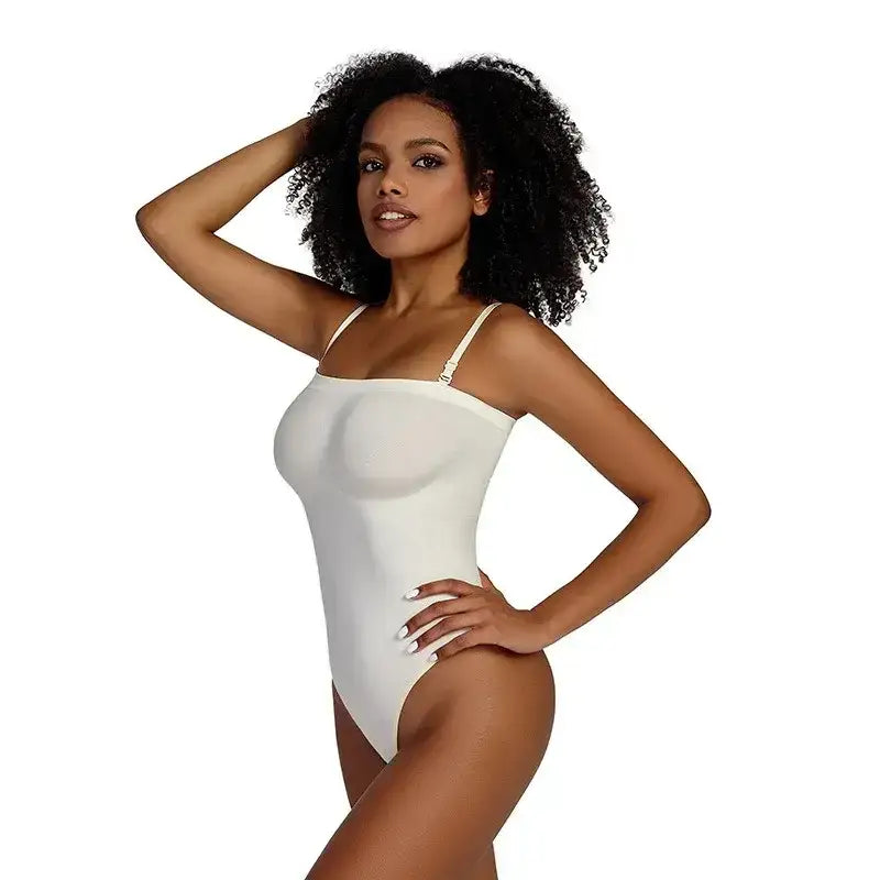 Model wearing white strapless thong bodysuit for women with adjustable straps from The Lady's Haven Boutique