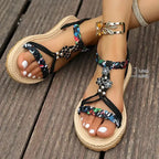 Summer floral flat sandals plus size with black floral straps and decorative flowers by The Lady's Haven Boutique