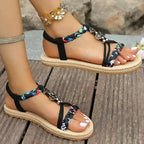Summer floral flat sandals plus size with braided straps and decorative flower charms from The Lady's Haven Boutique