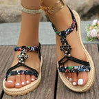 Summer floral flat sandals plus size in black with decorative flowers and braided straps from The Lady's Haven Boutique