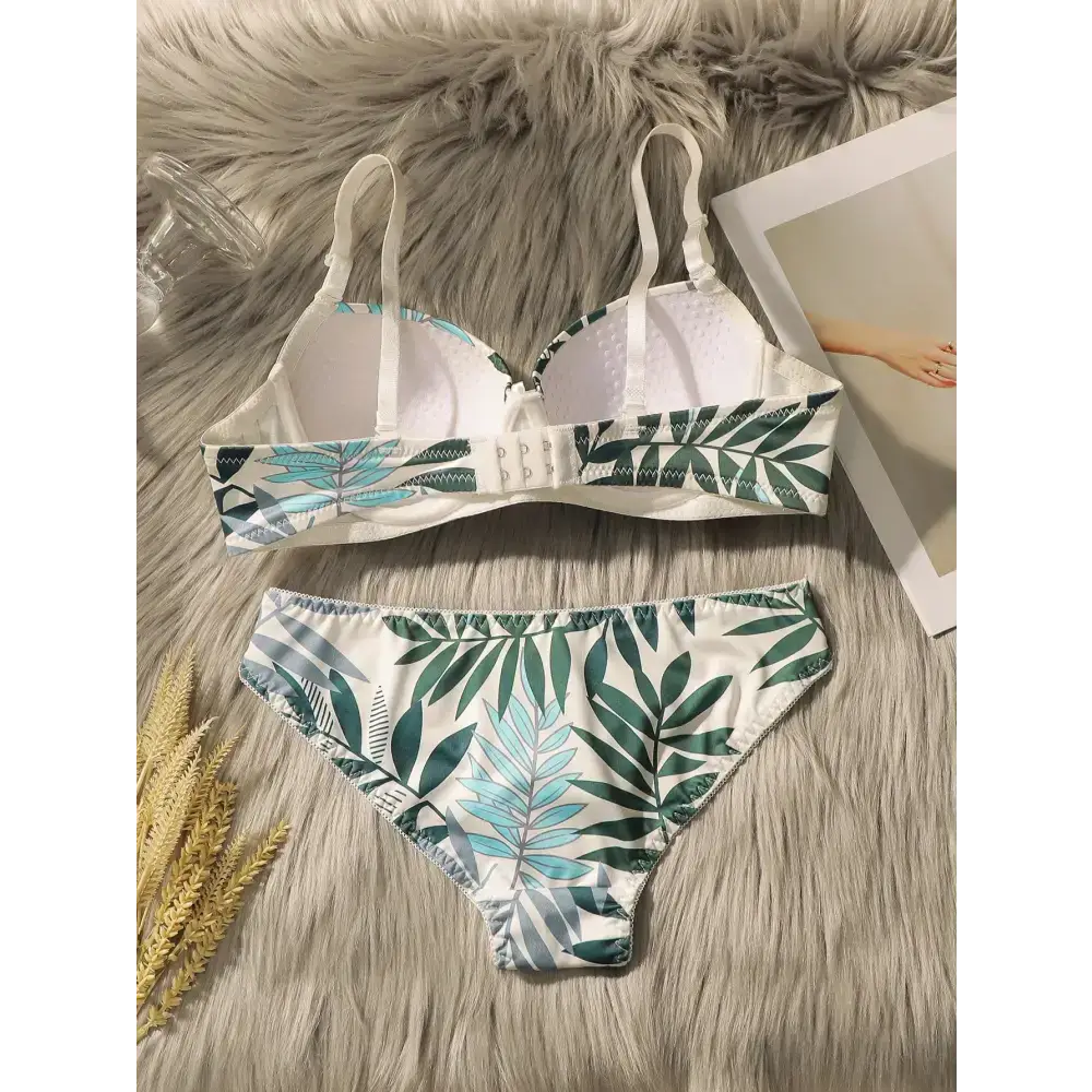Summer leaf print lingerie set with green and blue leaf patterns on a white background
