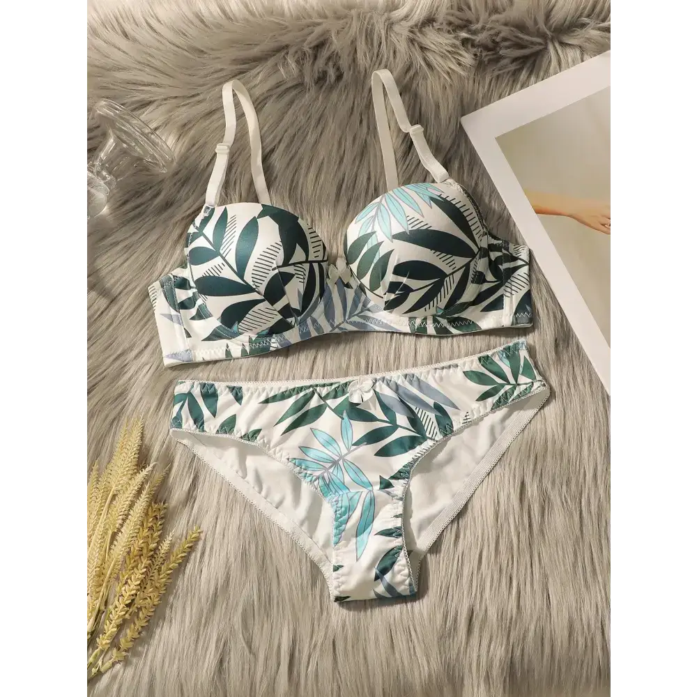 Summer leaf print lingerie set with green and blue tropical leaf design on white fabric