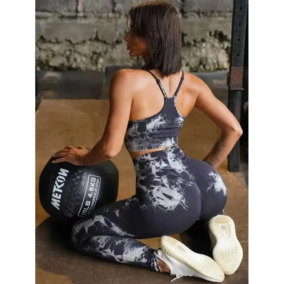 Stylish Tie Dye Yoga Women's Tracksuit featuring a workout bra and high waist leggings for seamless gym performance.