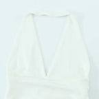 White off shoulder halter mini dress with deep neckline from The Lady's Haven Boutique