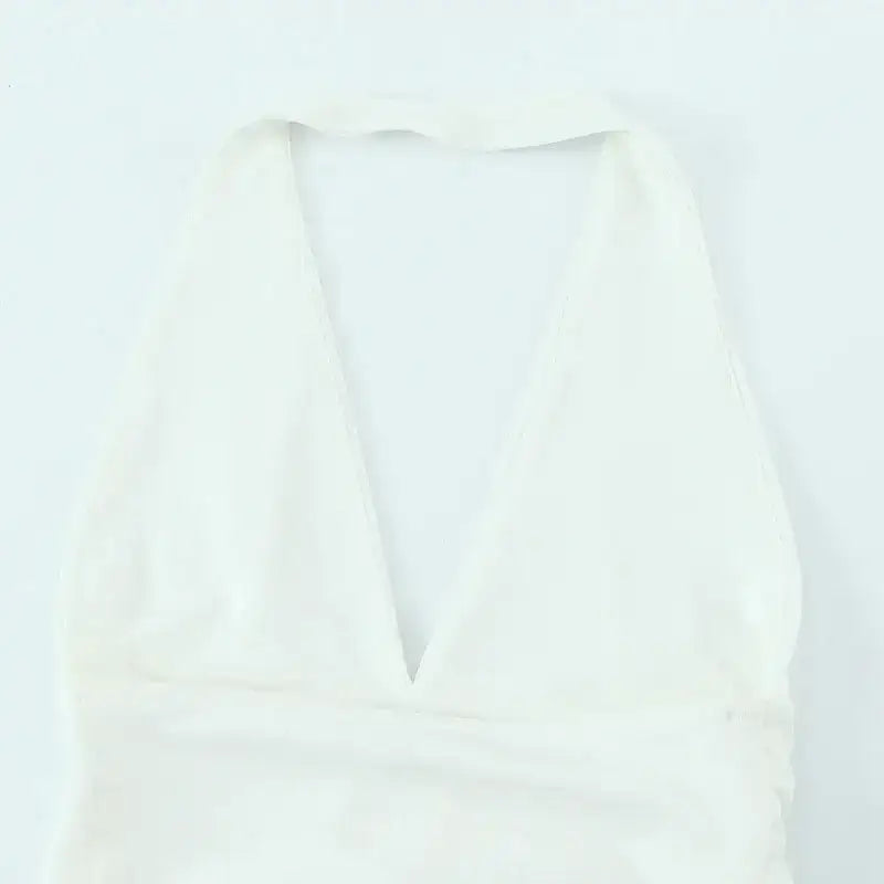 White off shoulder halter mini dress with deep neckline from The Lady's Haven Boutique