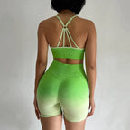 Stylish back view of a vibrant green two piece athletic wear set for women, designed for comfort and performance.