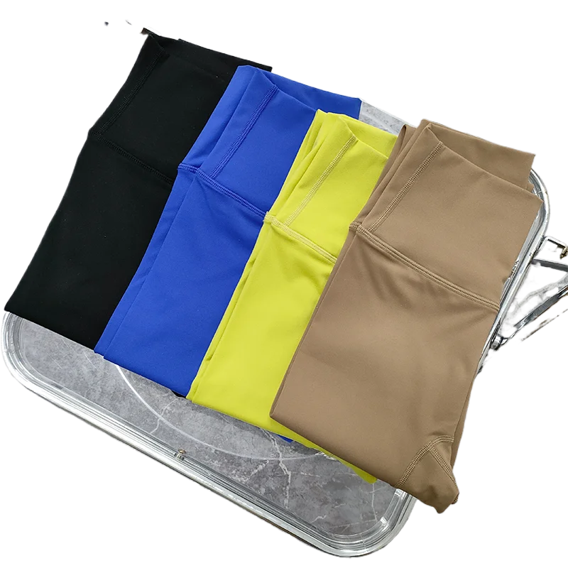Colorful two piece workout clothing for women displayed in black, blue, yellow, and brown options
