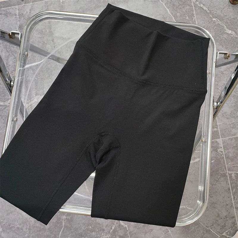 Black high-waisted leggings from The Lady's Haven Boutique, part of two piece workout clothing for women