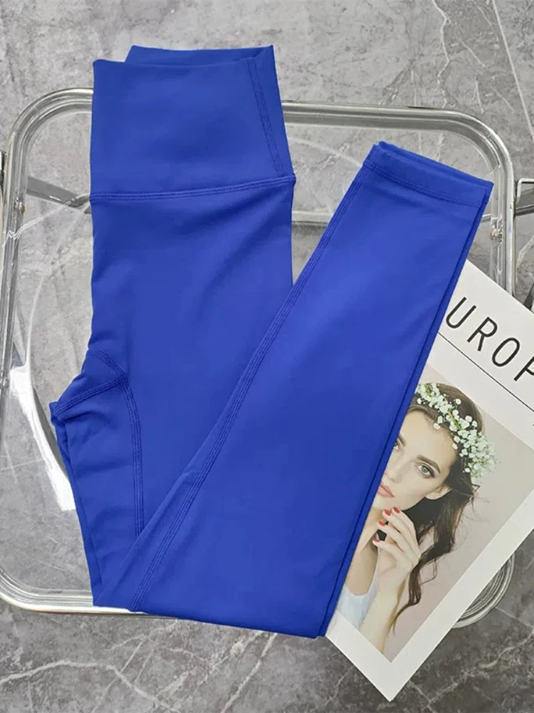 Vibrant blue leggings featuring a sleek design, ideal for two piece workout clothing for women.