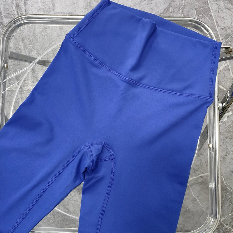 Close-up of vibrant blue leggings from The Lady's Haven Boutique, perfect for two piece workout clothing for women