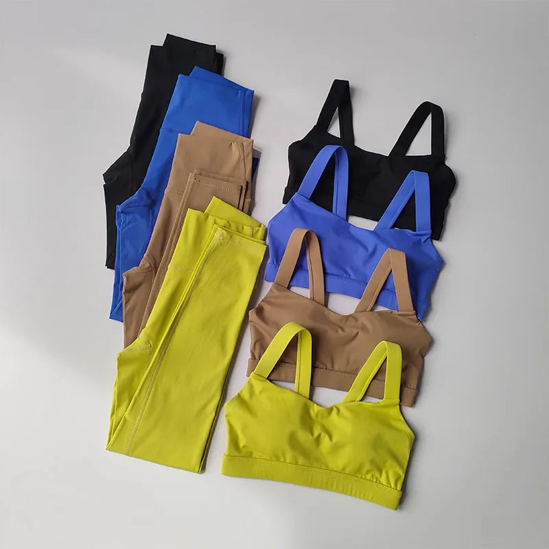 Variety of two piece workout clothing for women including colorful leggings and sports bras