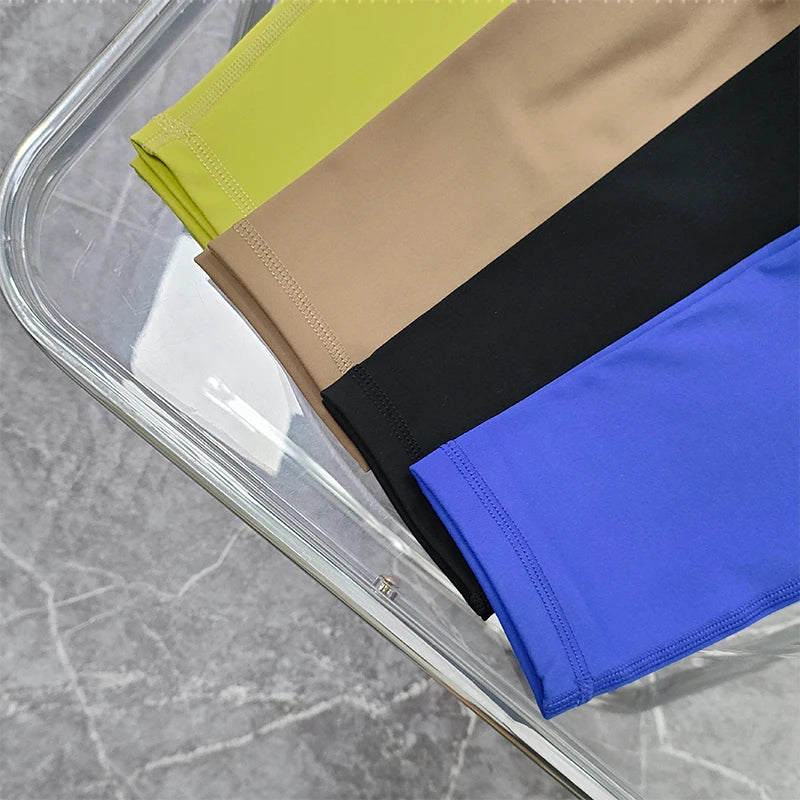 Colorful two piece workout clothing for women featuring green, beige, black, and blue fabric options