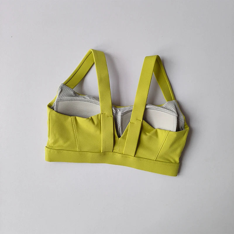 Stylish yellow sports bra from The Lady's Haven Boutique, perfect for two piece workout clothing for women
