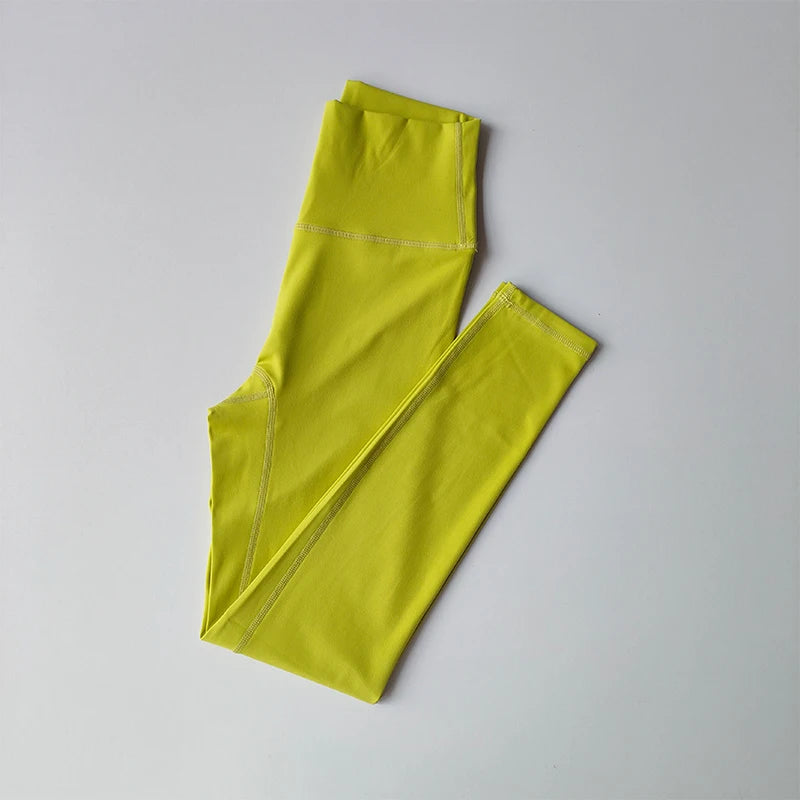 Bright yellow leggings perfect for active wear as part of two piece workout clothing for women