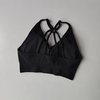 Black sports bra with crisscross straps from The Lady's Haven Boutique for two piece workout outfits