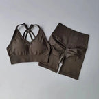 Brown two piece workout outfits including a stylish sports bra and matching shorts