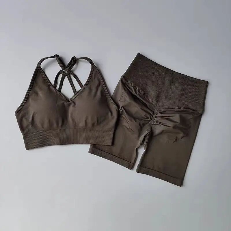 Brown two piece workout outfits including a stylish sports bra and matching shorts