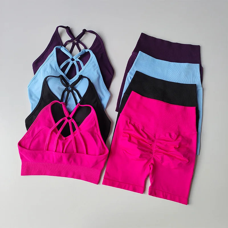 Colorful two piece workout outfits featuring stylish bras and comfortable shorts for active women