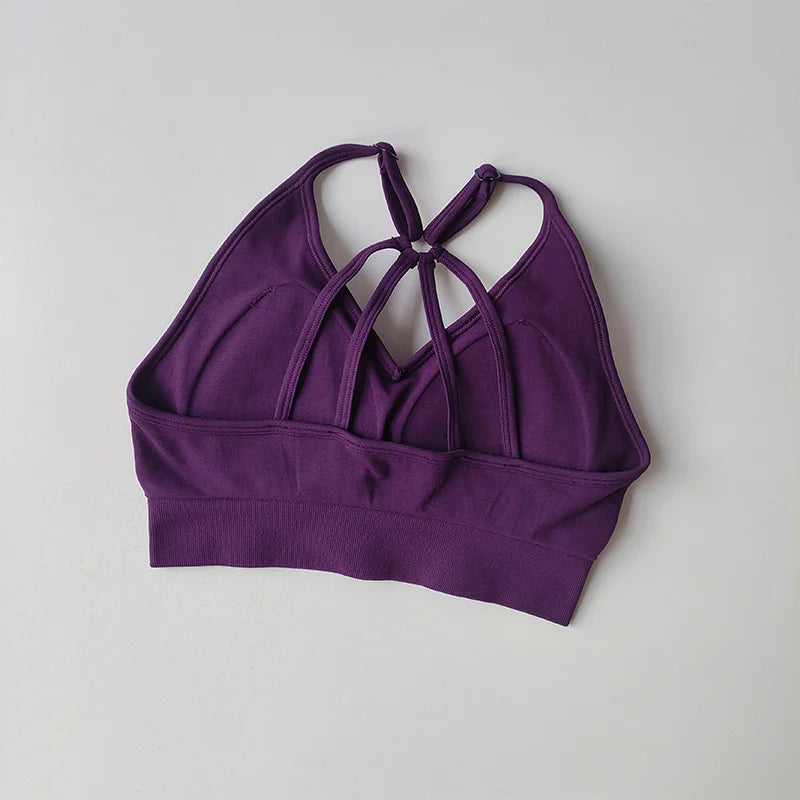 Purple sports bra featuring a stylish design for two piece workout outfits from The Lady's Haven Boutique