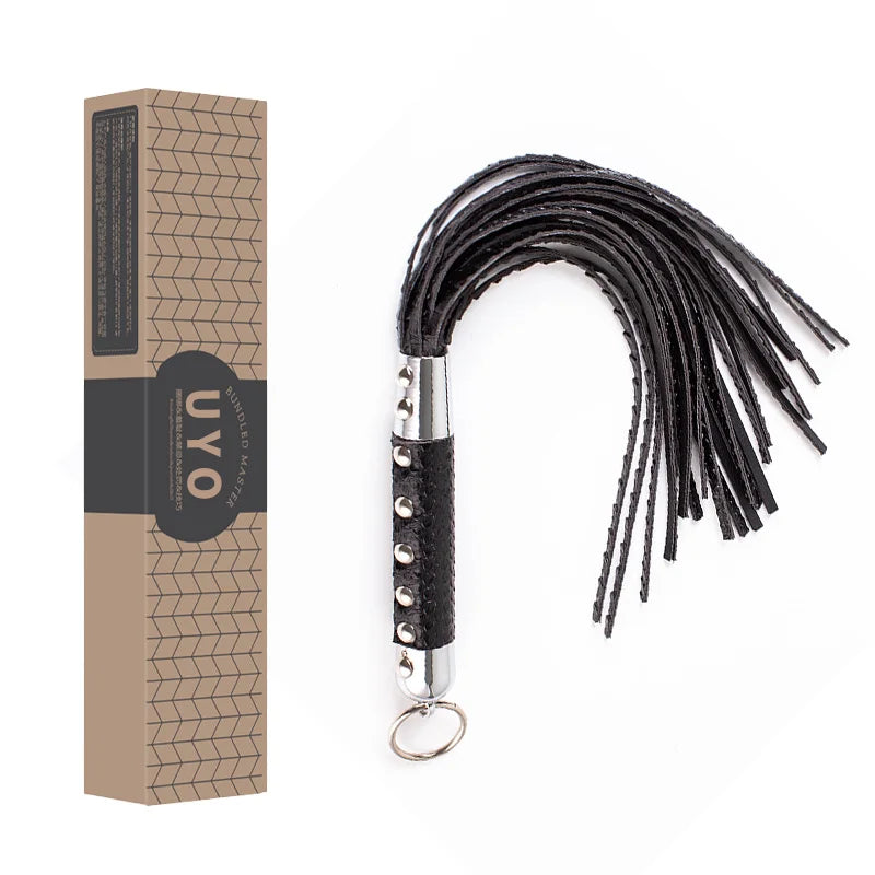 Black leather flogger with studded metal handle and box packaging for couple punishment BDSM whip