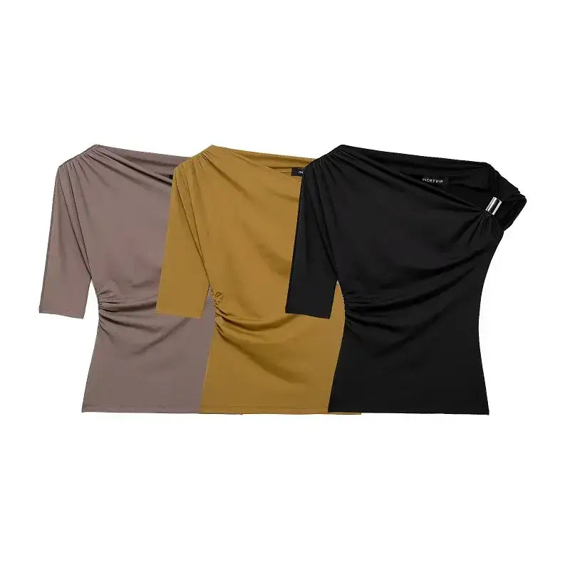 The Lady's Haven Boutique collection of spring fashion tops for ladies in black, mustard, and taupe colors