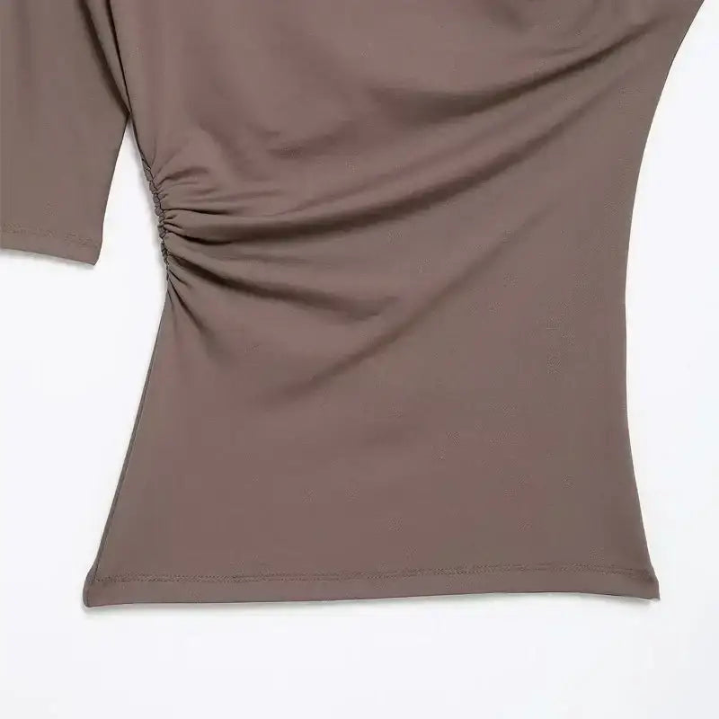 Close-up of brown ruched side detail spring fashion tops for ladies from The Lady's Haven Boutique