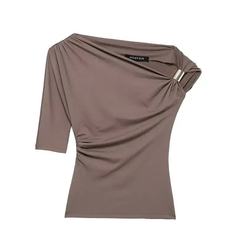 Taupe asymmetrical top with a metal ring detail from The Lady's Haven Boutique spring fashion tops for ladies