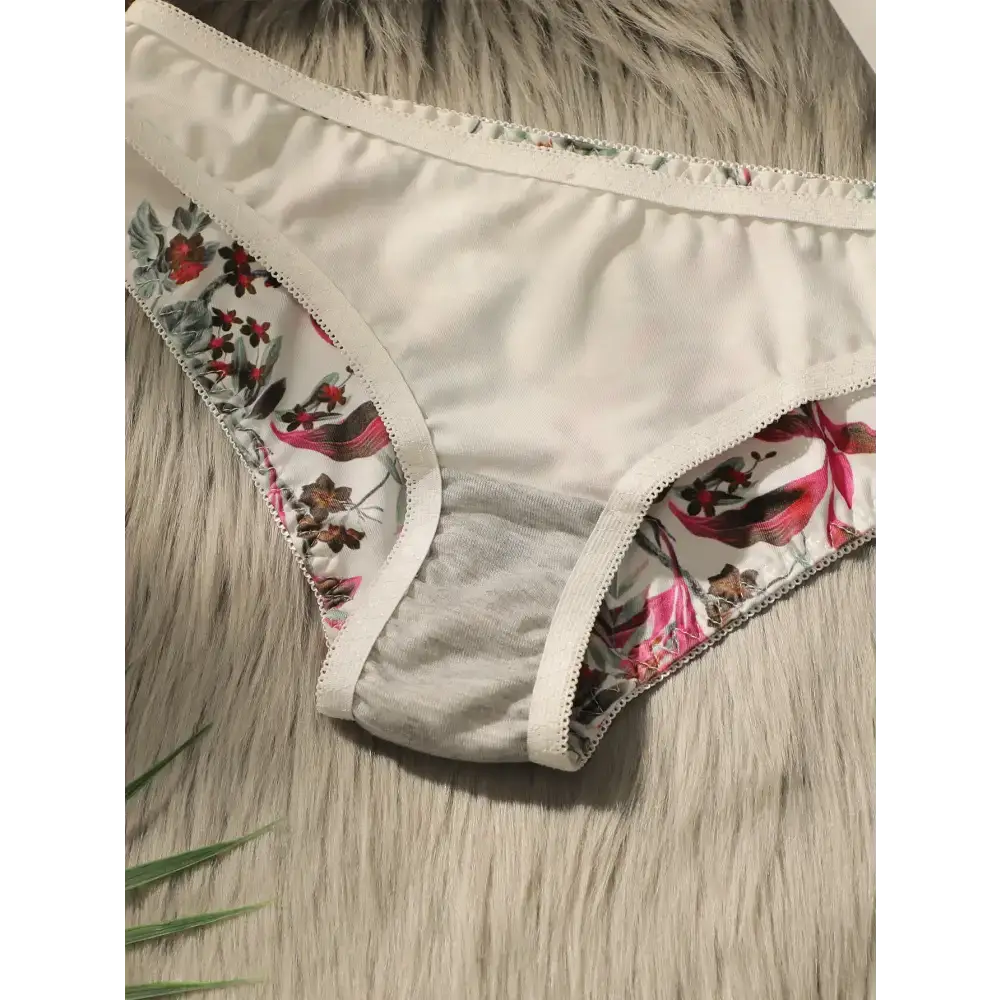 Close fitting floral bra and panty set panty with white fabric and colorful floral patterns