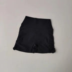Black drawstring sports shorts for women with a comfortable high waist design