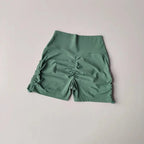 Green drawstring sports shorts for women with a comfortable fit and stylish design
