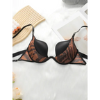 Fashion leopard bra and underwear set with black straps and animal print cups from The Lady's Haven Boutique