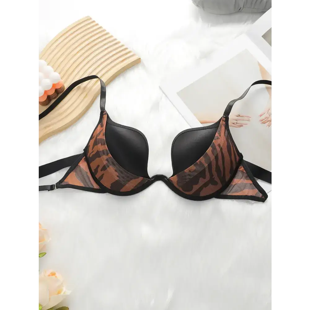 Fashion leopard bra and underwear set with black straps and animal print cups from The Lady's Haven Boutique