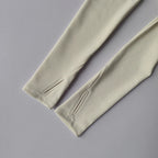 Beige long sleeve yoga crop tops for women with stylish slit detail on sleeves from The Lady's Haven Boutique