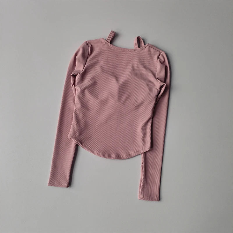 Soft pink long sleeve yoga crop tops for women with a stylish design and comfortable fit