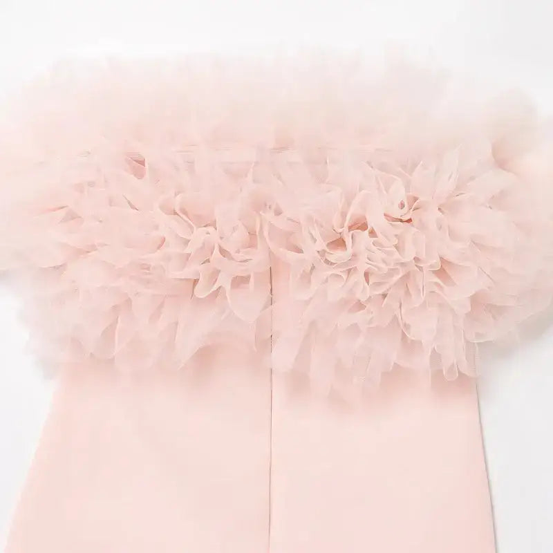 Close-up of pink casual cocktail dress featuring detailed ruffled tulle neckline from The Lady's Haven Boutique