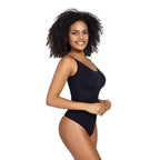 The Lady's Haven Boutique black ribbed thong bodysuit shapewear with thin straps on smiling model
