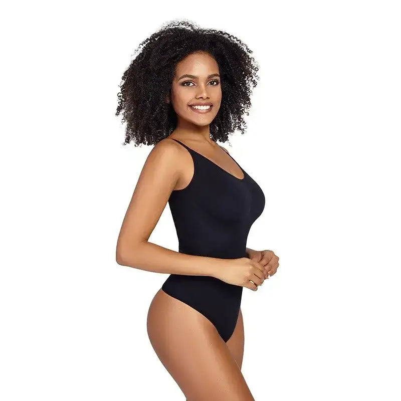 The Lady's Haven Boutique black ribbed thong bodysuit shapewear with thin straps on smiling model
