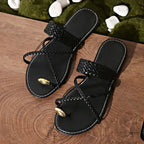 The Lady's Haven Boutique Rome style ring toe flat sandals in black with braided straps and gold accent