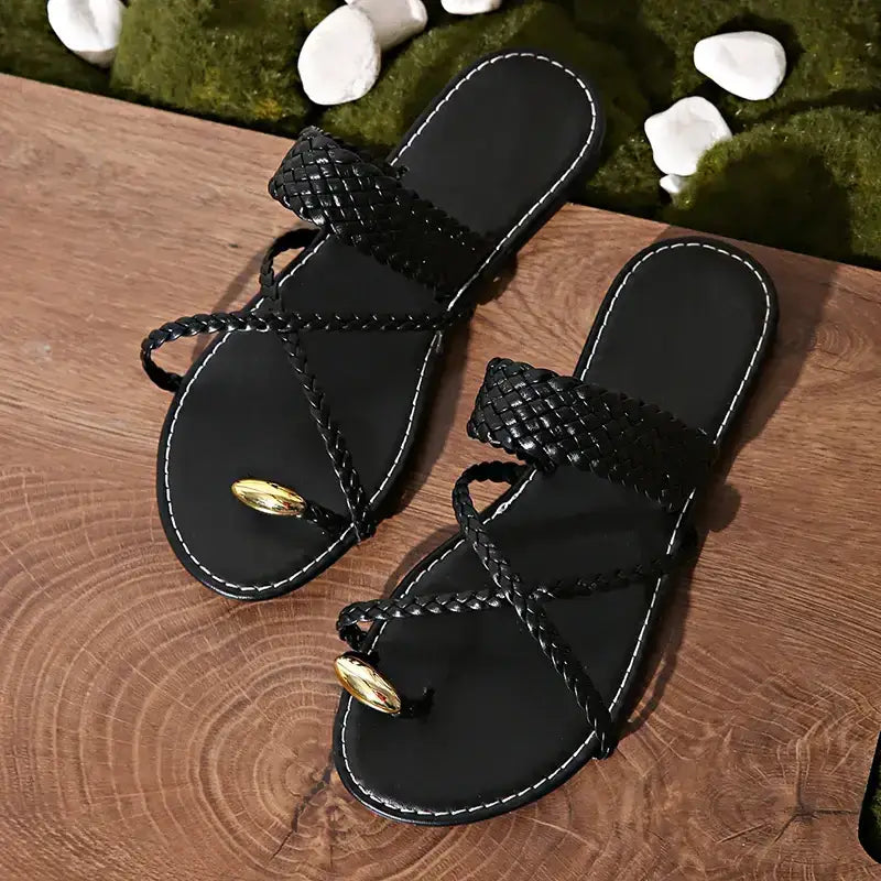 The Lady's Haven Boutique Rome style ring toe flat sandals in black with braided straps and gold accent